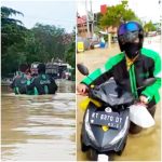 Ojol Terjang Banjir Demi Pelanggan