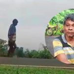 Pria Menenteng Kepala Manusia