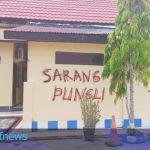 Polisi Coret Dinding kantor